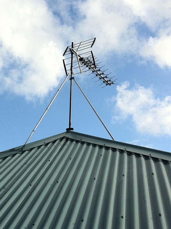 an aerial installed at top of roof in grey lynn