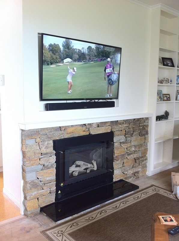a tv we did wall mounting above fireplace out in Meadowbank
